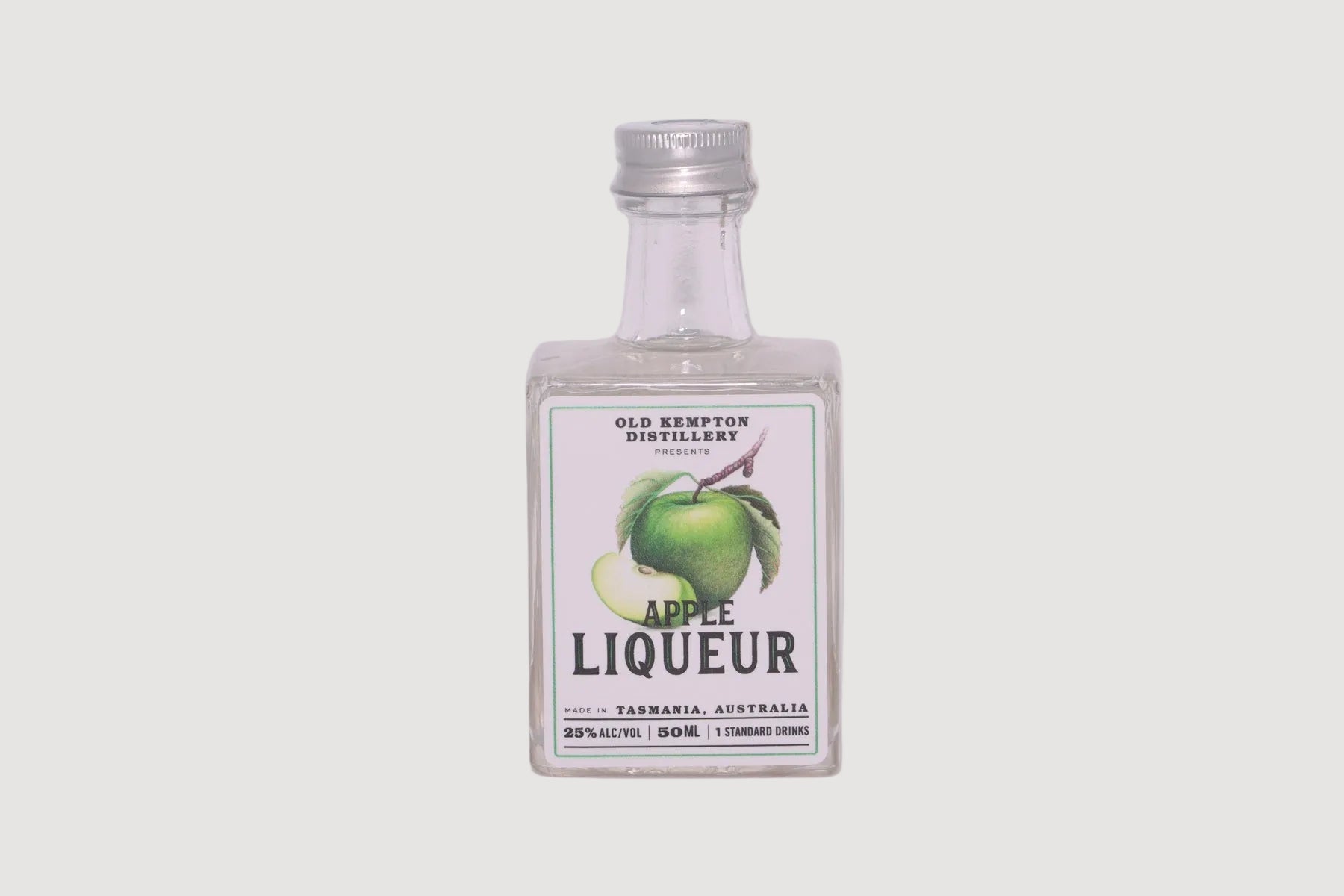 Bottle of Old Kempton Apple Liqueur on a white background